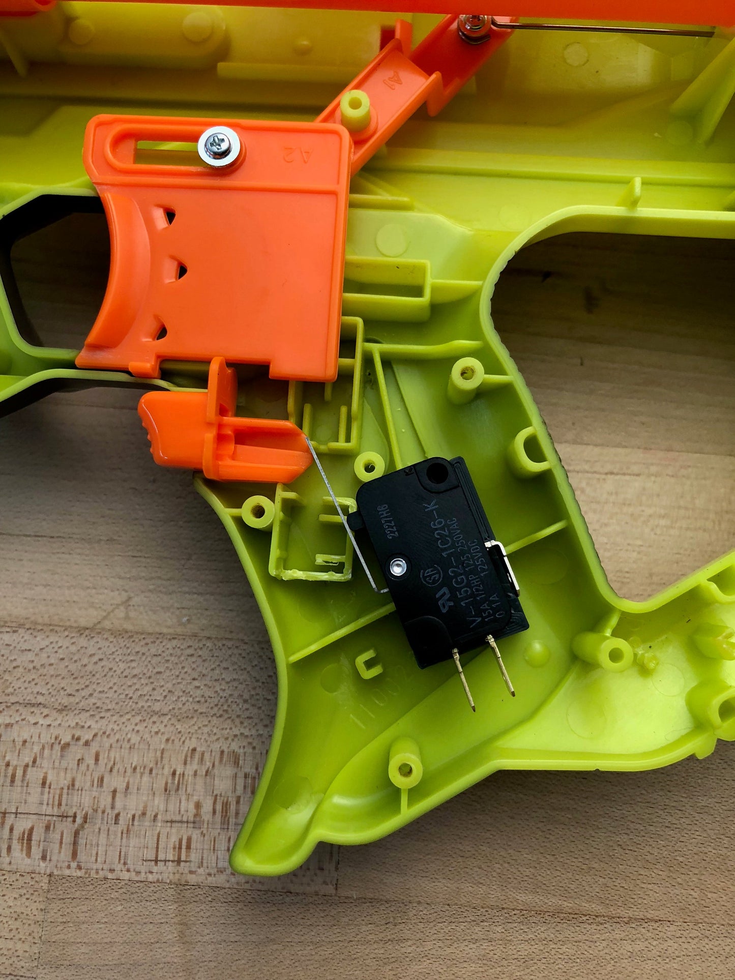 Nerf Rayven Switch mounting plate 3d printed (Ideal rev trigger switch placement)